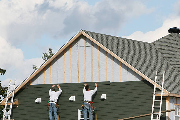 Professional Storm Damage Siding Repair technician working in Pelham, GA